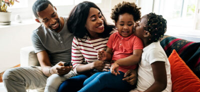 a happy family from Nigeria living in Canada