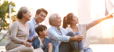 parents and grandparents in a park