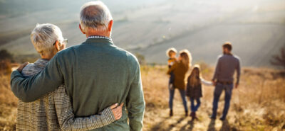 a family walking with parents and grand parents