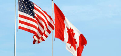 Canadas's and USA flags one next to the other