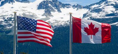 USA and Canada flags rised
