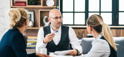 immigration lawyer talking with spouses