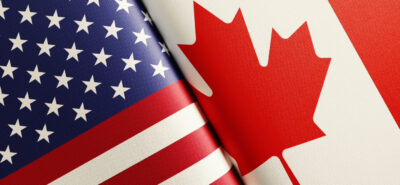 Canada-US Flags joined together to represent dual citizenship